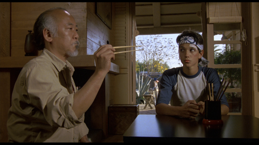 A famous scene from the film The Karate Kid